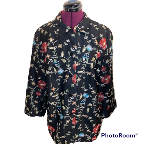 Dressbarn Woman black silk embroidered floral button down jacket.